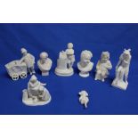 Seven various Parian-style china figures including a young boy with cart, two classical busts,