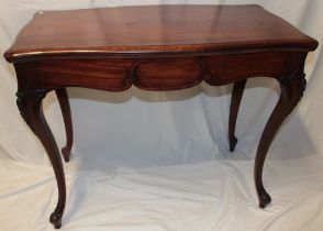 A late Victorian/Edwardian mahogany rectangular turn-over-top card table with baize lined playing