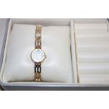 A ladies' 9ct gold wristwatch by Rotary with 9ct gold pierced link strap in original case with