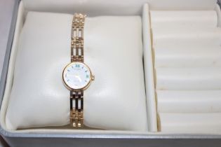 A ladies' 9ct gold wristwatch by Rotary with 9ct gold pierced link strap in original case with