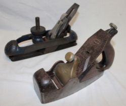 An old steel framed carpentry plane by Norris marked "Norris A5 London Patent Adjustable",