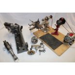 A jeweller's/watchmaker's lathe with accessories together with a jeweller's magnifier by C.