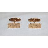 A pair of 9ct gold gent's cuff-links with engraved initials (7.