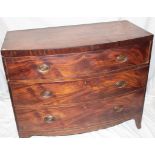 A 19th century mahogany bow front chest of three long graduated drawers with brass ring handles on