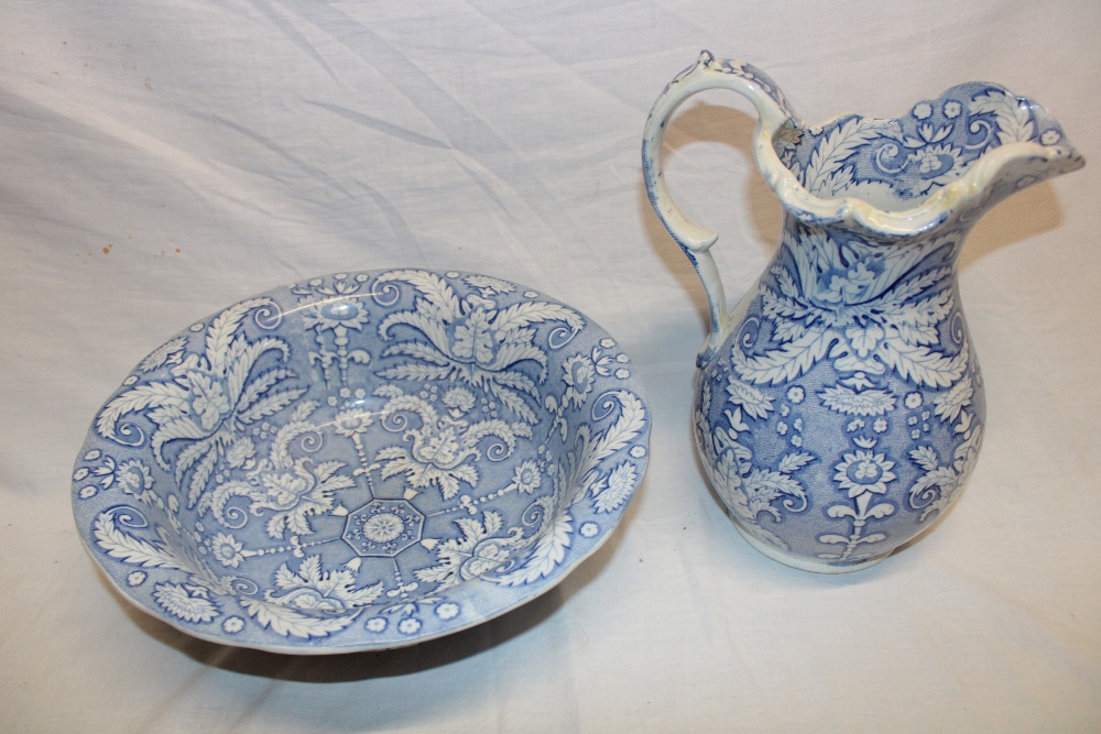 A 19th century Staffordshire pottery baluster-shaped water jug with blue and white floral - Image 2 of 2