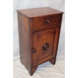 A Victorian mahogany bedside cabinet with a single door in the frieze and a cupboard enclosed by a