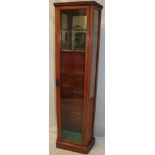 A polished oak slim collector's display case with glass shelves and part mirror back enclosed by a