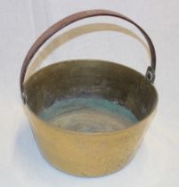 A 19th century copper circular preserve pan with iron strap handle