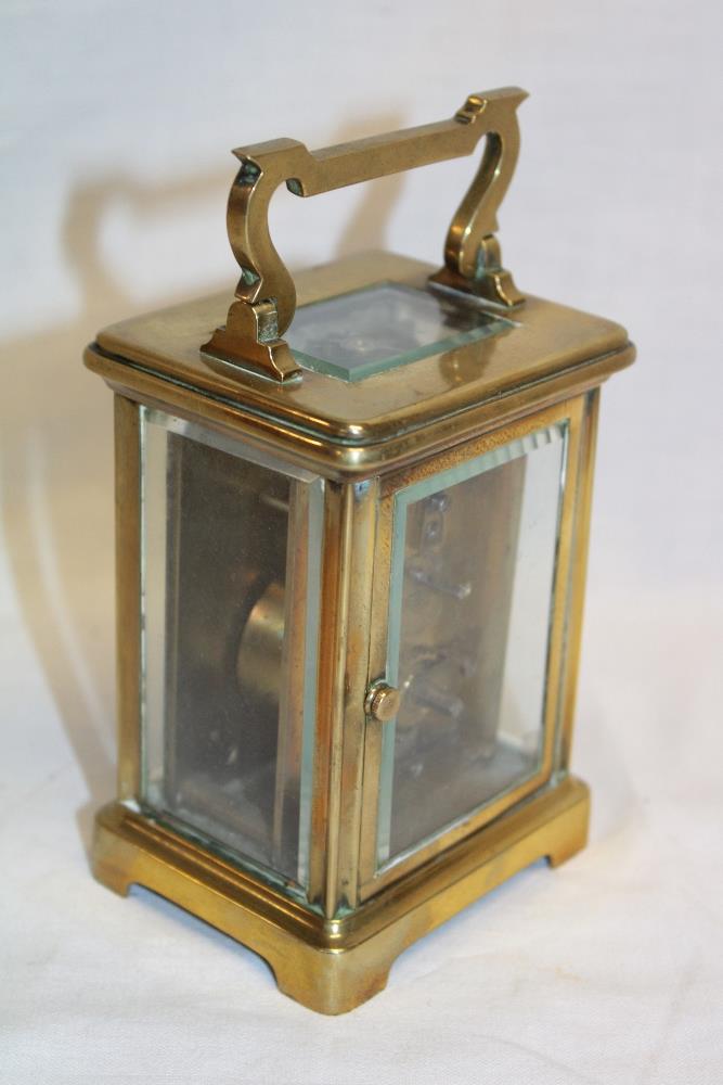 A French carriage clock with rectangular enamelled dial in brass traditional glazed case - Image 2 of 2