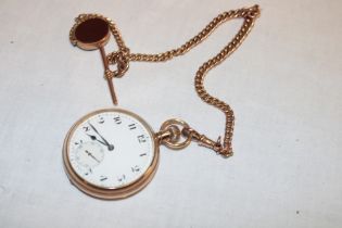 A gentleman's 9ct gold pocket watch with circular enamel dial in plain case together with 9ct gold
