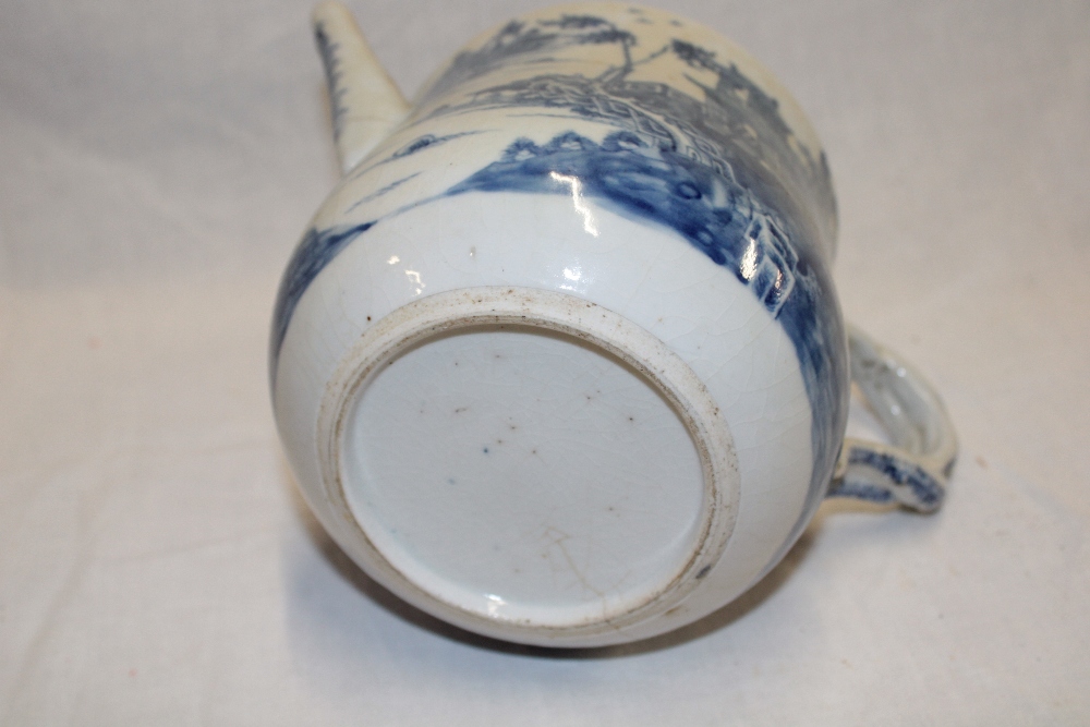 An 18th century Chinese circular tea pot with blue and white landscape and floral decoration and - Image 2 of 2
