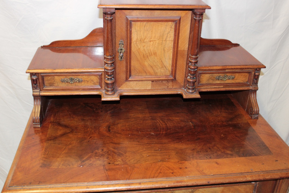 A late 19th century figured walnut writing desk with a single drawer in the frieze below central - Image 2 of 2