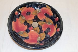 A Moorcroft pottery "Pomegranate" pattern circular comport top 8½" diameter (minus base)
