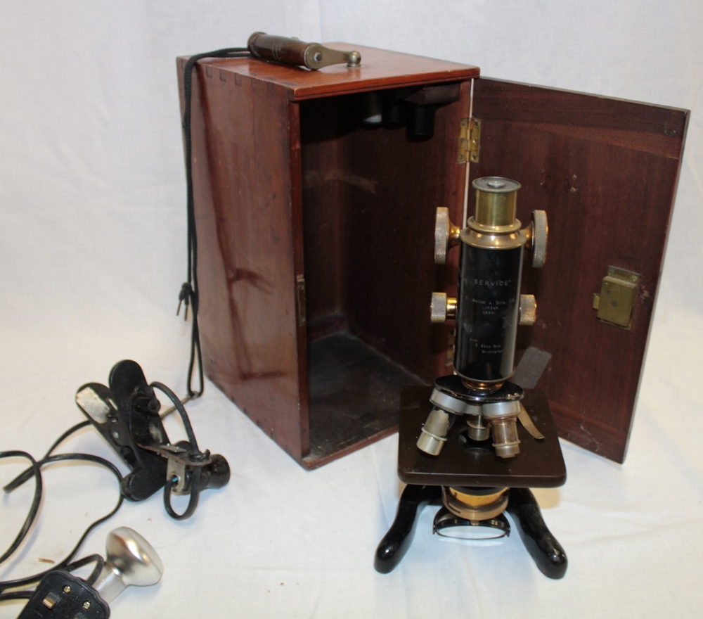 A brass and painted metal monocular (service) microscope by Watson & Sons Limited London in fitted