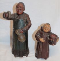 A Continental pottery figure of a monk drinking from a tankard,