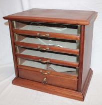 An unusual old brass mounted mahogany table top millinery chest,