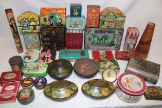 A selection of various vintage tins including Jacobs Butter Crackers, Rowntree's Coco, Balto,