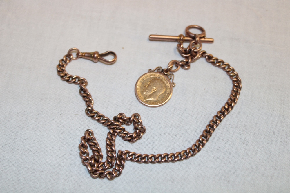 A 9ct gold pocket watch chain mounted with a 1912 gold half sovereign (35.