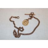 A 9ct gold pocket watch chain mounted with a 1912 gold half sovereign (35.