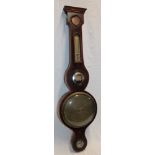 A 19th century mercury barometer by Spelzume of Edinburgh with circular dial below mirror and