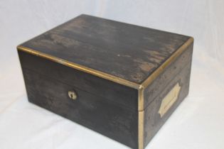 A 19th century brass mounted coromandel rectangular table box (minus interior fittings),
