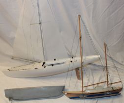 A modern composition pond yacht with sails,