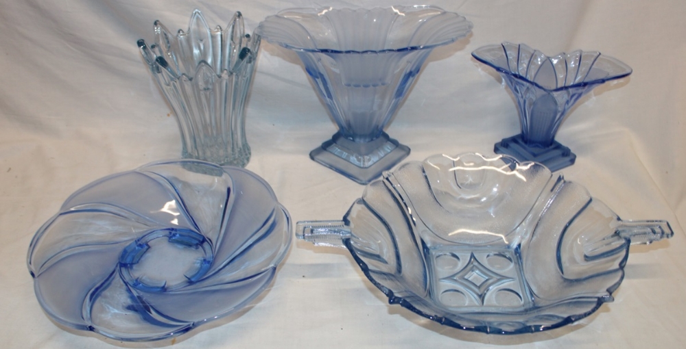 Five pieces of blue tinted glassware including a circular two handled bowl, 16" long; tapered vase,
