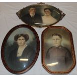 Three ornamental photo frames with convex glass including ornate brass oval photo frame,