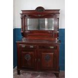 A Victorian Art Nouveau walnut sideboard with mirror back,