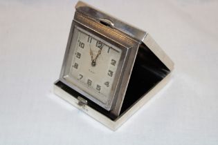 A silver cased 8-day travelling clock for the Goldsmith's and Silversmith's Company of London in