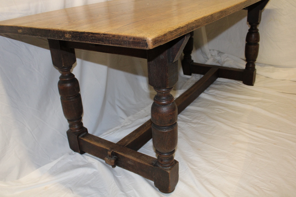 An oak rectangular refectory-style dining table on baluster-shaped supports, - Image 3 of 3