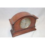 A good quality mantel clock with silvered circular dial by Robinson & Co.