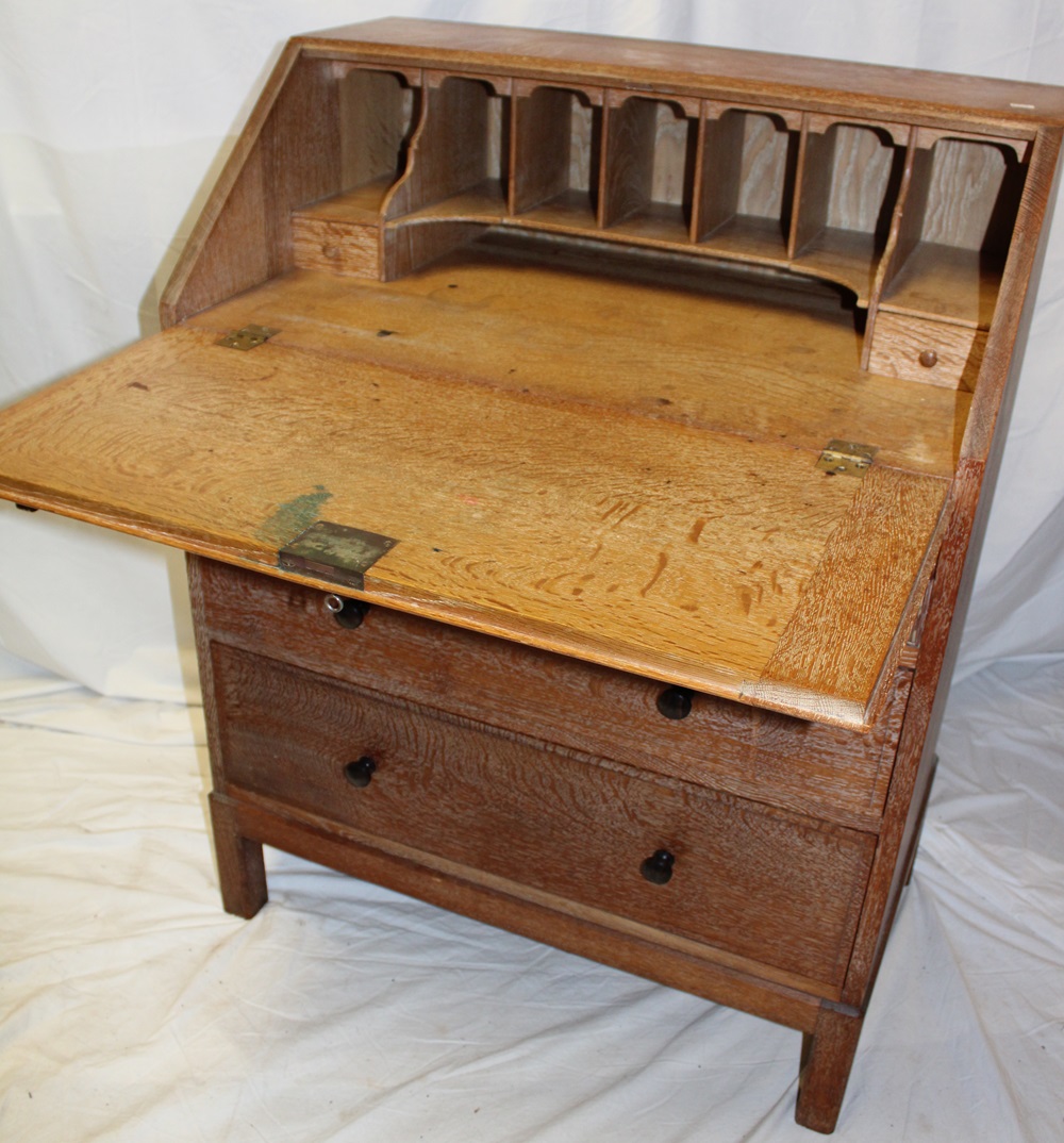 A 1930's/40's limed oak bureau by Heal & Son Limited London with pigeon holes and drawers enclosed - Image 2 of 4