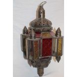 An unusual brass hanging pulpit lamp with red, amber and clear tinted glass panels,