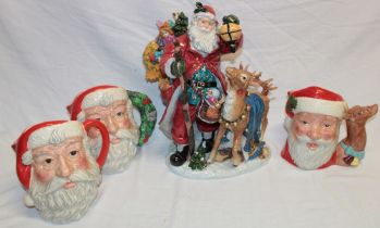 A large Continental china figure of Father Christmas with reindeer and presents,