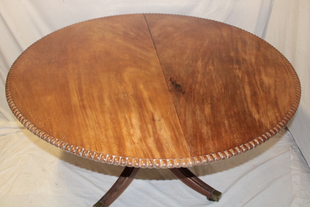 An early to mid 19th century figured mahogany turn-over-top breakfast table with fluted edge, - Image 2 of 2