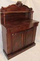 A Victorian mahogany serpentine-fronted chiffonier with a single drawer in the frieze and cupboard