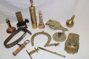 A selection of various decorative metal ware including embossed brass wall mounted match holder