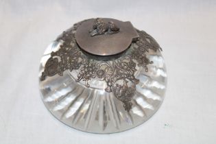 A good quality late Victorian heavy cut-glass and silver mounted inkwell decorated in relief with