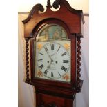 A 19th century Welsh long case clock with 14" painted arched dial by Thomas of Cardigan with