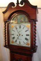 A 19th century Welsh long case clock with 14" painted arched dial by Thomas of Cardigan with