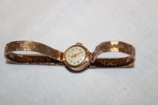 A ladies' 9ct gold wristwatch by Rone with 9ct gold strap (18.