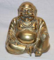 An Eastern bronzed/brass Buddha figure,