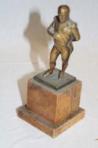 A small bronze figure of Napoleon on marble square base,