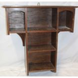 An Edwardian oak hanging wall shelf,