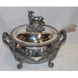 A 19th century silver-plated oval two-handled tureen and cover with raised scroll decoration,