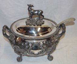 A 19th century silver-plated oval two-handled tureen and cover with raised scroll decoration,