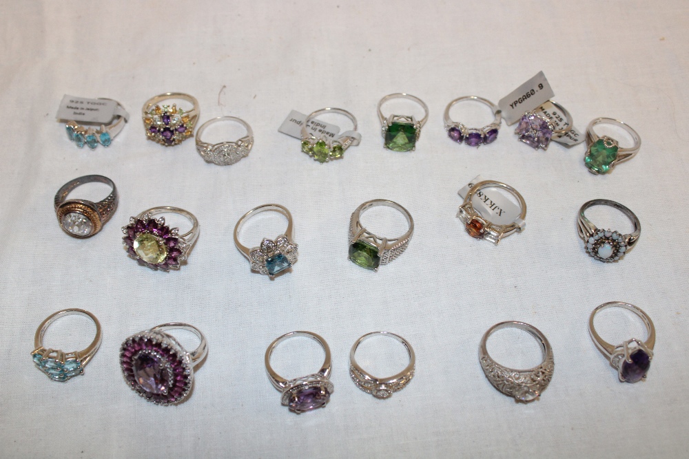 Twenty various silver dress rings set semi-precious stones