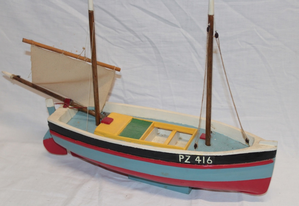 A hand crafted and painted model of a Cornish fishing boat "Guide Me Penzance",