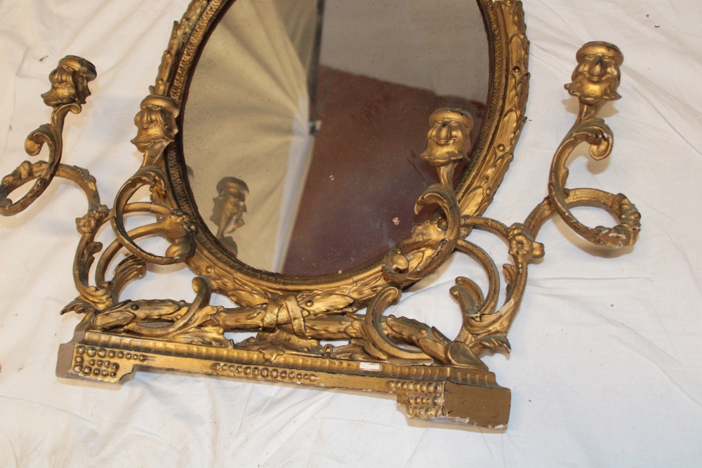 A George III oval wall mirror/over mantel mirror in ornate gilt frame with two attached pairs of - Image 2 of 4
